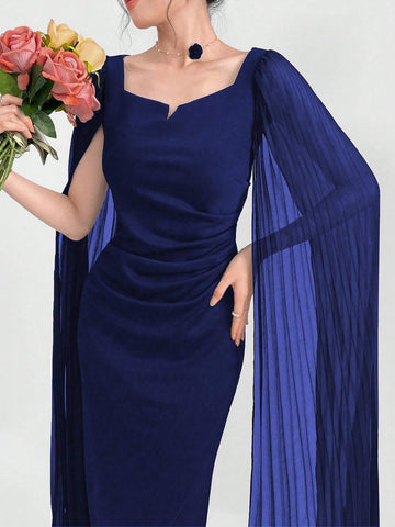 Modely Elegant Dress With A Notched Collar, Pleats, Cinched Waistline, Cape Sleeves