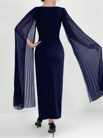 Modely Elegant Dress With A Notched Collar, Pleats, Cinched Waistline, Cape Sleeves