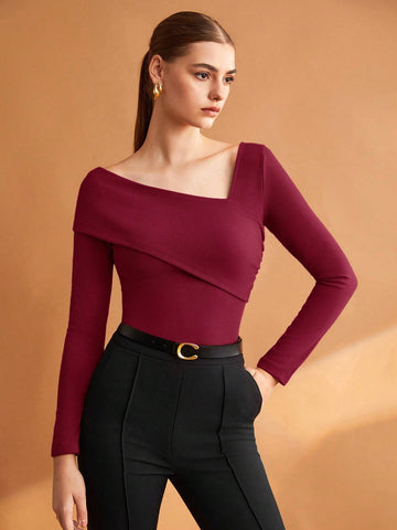 BIZwear Women's Black Solid Color Asymmetrical Neckline Stretch T-Shirt