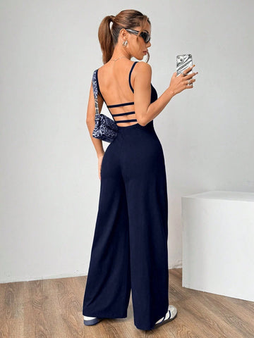 Flirla Solid Color Open Back Camisole Romper
