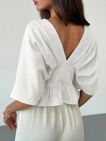 Solid Color V-Neck Ruffle Hem Blouse