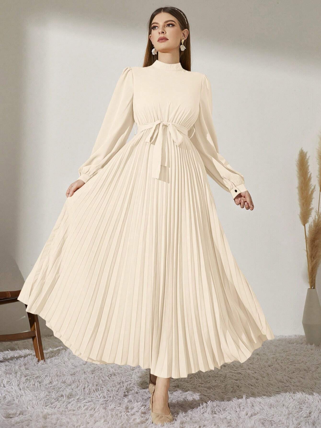 Modely Mock Neck Lantern Sleeve Pleated Hem Belted Dress