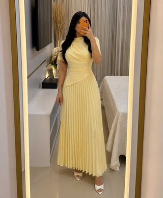 Dress With Draped Asymmetrical Hem And Pleated Details